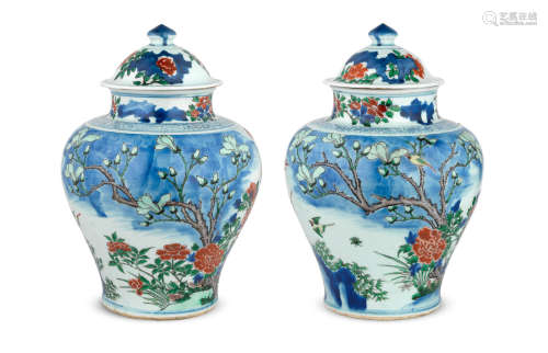 Shunzhi A rare pair of wucai baluster vases and covers