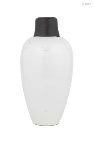 Yongzheng six-character mark and of the period A rare white-glazed ovoid vase