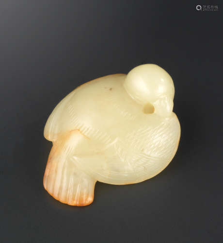 Song Dynasty A rare yellow and russet jade carving of a bird