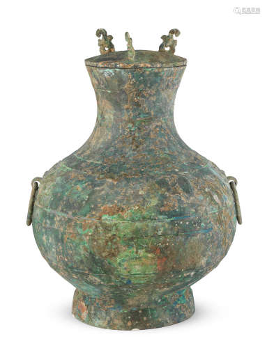 Han Dynasty  An archaic bronze wine vessel and cover, Hu