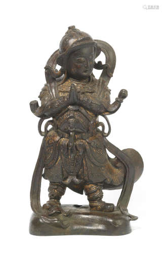 Ming Dynasty A bronze figure of a Guardian deity