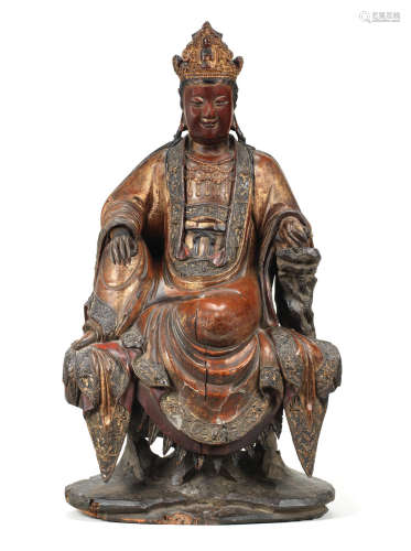 Cyclically dated by inscription to Dingmao year, corresponding to 1567 or 1627, and of the period A very rare gilt-lacquered wood documentary figure of Guanyin