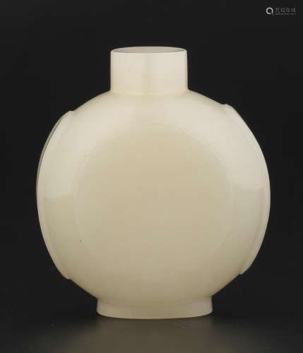 A white jade circular snuff bottle