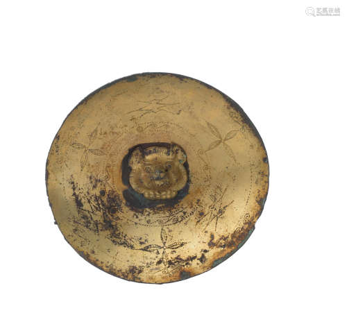 Han Dynasty A rare gilt-bronze circular plaque with bear finial