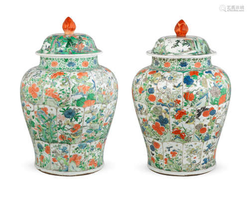 Kangxi a large pair of famille verte baluster jars and two covers