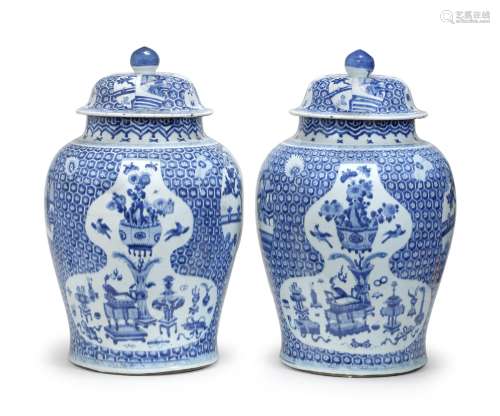 Kangxi A pair of blue and white baluster jars and covers