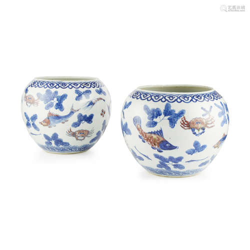 PAIR OF LARGE COPPER-RED DECORATED BLUE AND WHITE FISH BOWLS