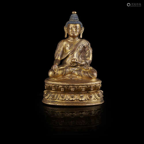 SINO-TIBETAN GILT-BRONZE FIGURE OF BHAISAJYAGURU, THE BUDDHA OF MEDICINE