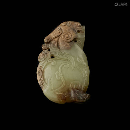 CELADON AND RUSSET JADE PENDANT IN THE FORM OF A BIXIE