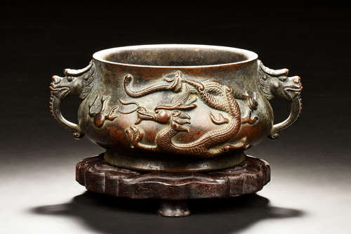 BRONZE CAST 'DRAGONS' CENSER WITH WOODEN STAND