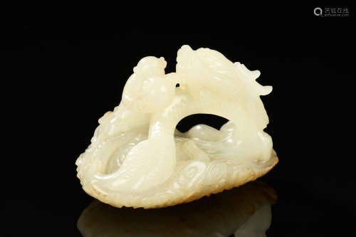 WHITE JADE CARVED 'DRAGON AND BOY' FIGURE