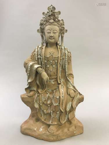 A Celadon Glazed Guanyin Statue