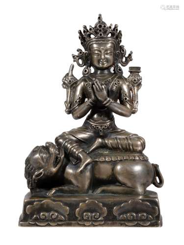 A Sino-Tibetan silver coloured alloy figure of Manjusri , China