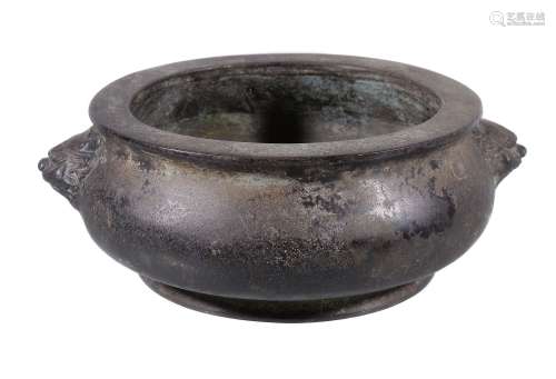 A Chinese bronze censer, with two Buddhist lion handles