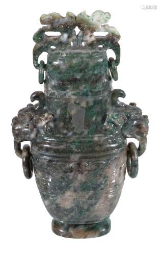 A Chinese hardstone vase and cover, with green white and brown inclusions