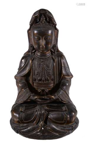 A Chinese gilt-bronze figure of Guanyin , Late Ming or early Qing Dynasty