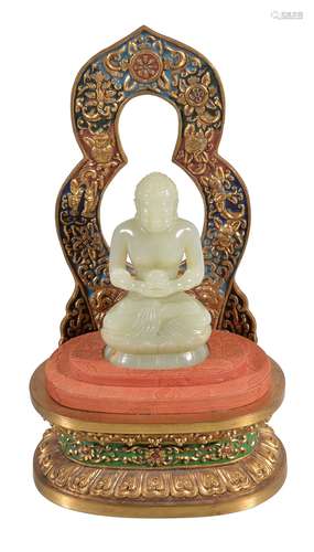 A Chinese celadon jade Buddha , and a Chinese enamel and gilt bronze throne...