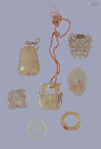 A group of seven Chinese jade pendants and plaques