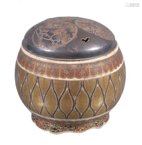 A Japanese Satsuma koro and silver cover, the drum shaped pottery body...