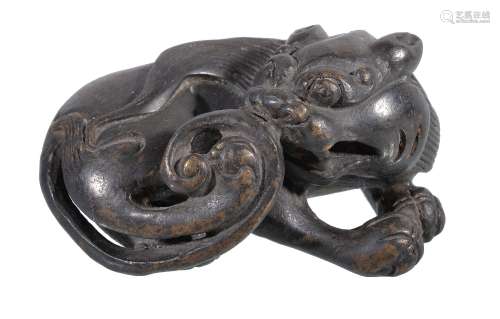 A Chinese Bronze Scroll Weight, Qing Dynasty