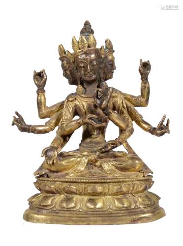 A Sino-Tibetan parcel gilt bronze figure of Avalokitesvara or Usnisavijaya