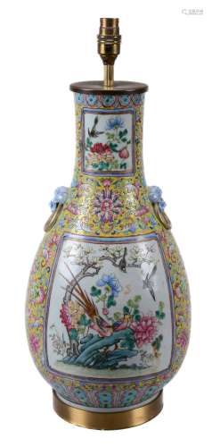 A Chinese yellow-ground vase , late Qing Dynasty, of slender baluster form