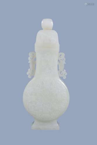 A Chinese white jade vase and cover, of even tone and slender flattened form