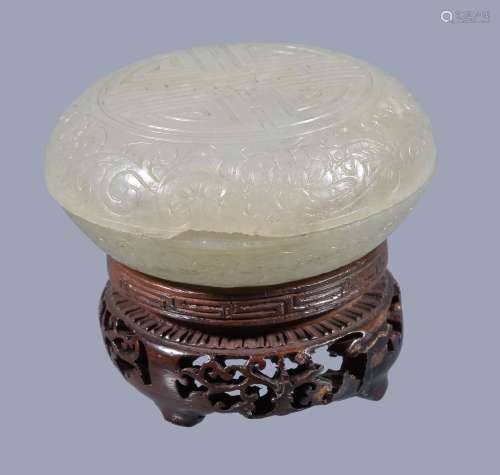 A Chinese pale celadon jade 'shou' circular box and cover, Qing Dynasty