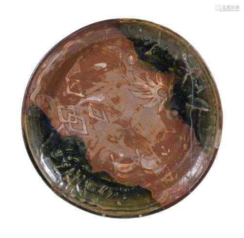 A Large Japanese Oribe Pottery Dish of irregular circular form