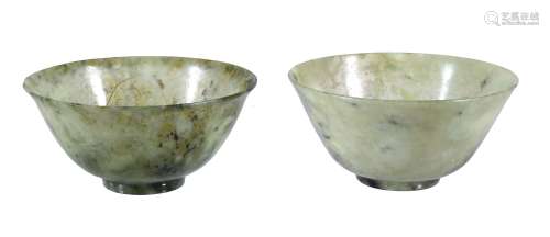A pair of Chinese green hardstone bowls, with spinach-green