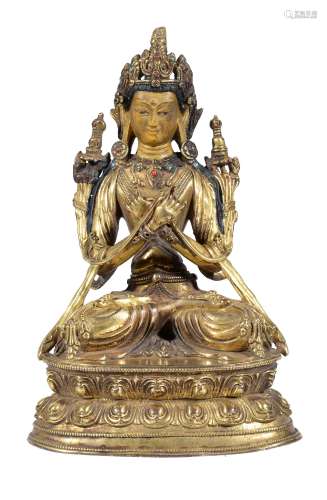Ω A Sino-Tibetan gilt-bronze figure of Vajradhara, Tibet, 16th/17th century