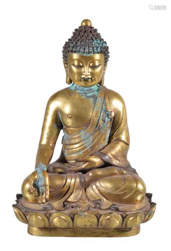 A Chinese gilt-bronze of Ratnasambhava , one of the five meditation Buddhas’...