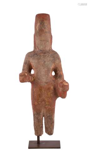 A Khmer stone sculpture of a male deity , probably 6-7th century