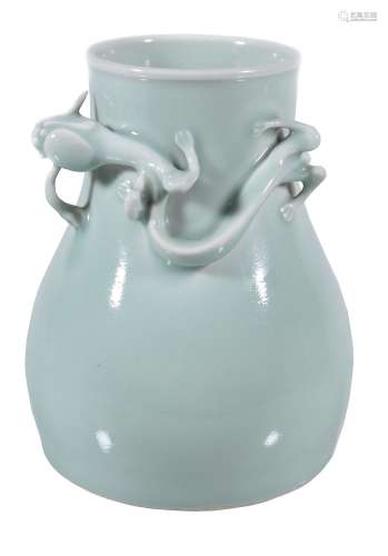 A Chinese celadon glazed 'dragon' vase, the neck applied with a dragon