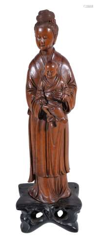 A Chinese wood carving of Quanyin, probably Huangyang wood, well detailed