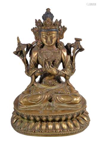 A Sino-Tibetan gilt-bronze figure of Maitreya