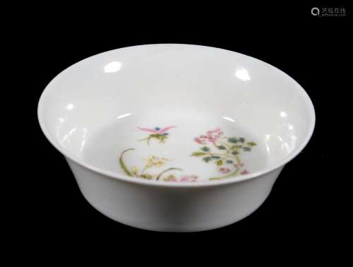 A small Chinese Famille Rose bowl, the interior painted in lime-green