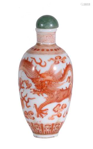 A Chinese iron-red 'dragon' snuff bottle and stopper