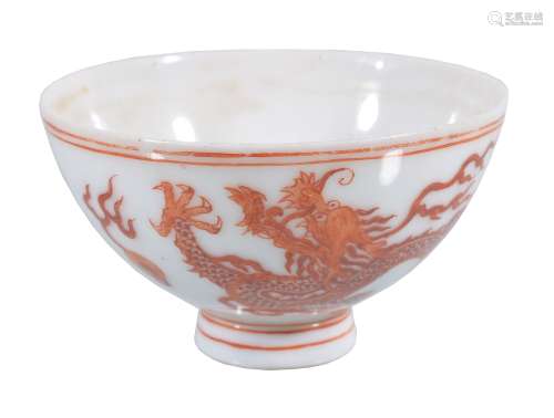A small Chinese iron-red 'dragon' wine cup