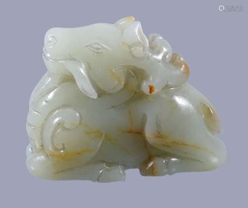 A Chinese celadon and russet jade Þer' pendant