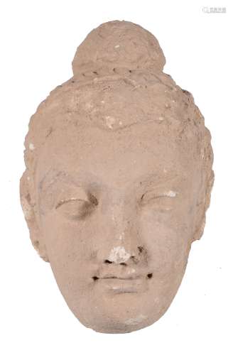 A Gandhara stucco fragmentary head of a Buddha, 4th-5th century