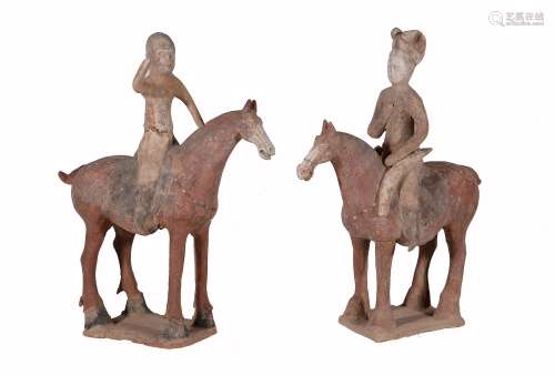 Two Chinese Pottery groups of a horse and rider, Tang Dynasty or later