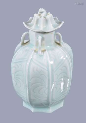 A Qingbai type vase and cover, the ovoid body with concave flutes and the...