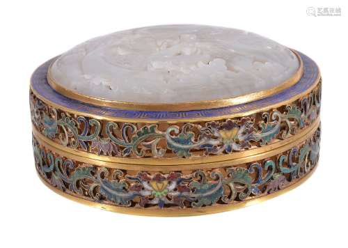 A Chinese white jade and enamel circular box and cover