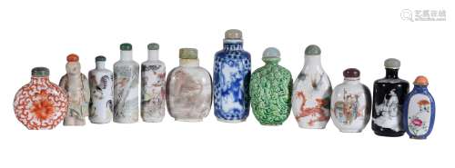 Twelve Chinese porcelain snuff bottles and stoppers, comprising