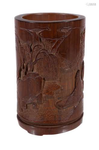 A Chinese bamboo brush pot, carved with a scholar on a boat and another...