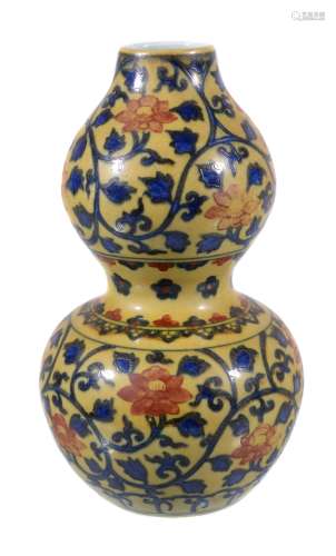 A Chinese double gourd vase yellow-ground vase