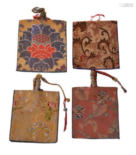 A rare collection four Tibetan water bottle covers