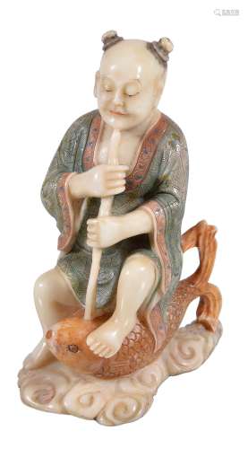 A Chinese soapstone carving of a fisherman