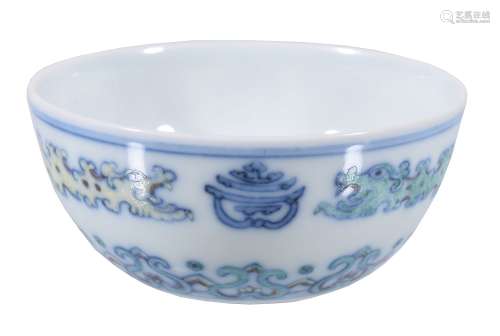 A small Chinese Doucai bowl, the exterior painted in yellow